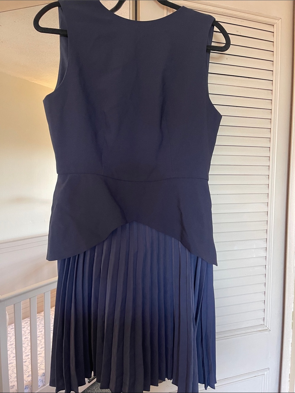 Commense Navy Sleeveless Peplum Dress with Pleated Skirt